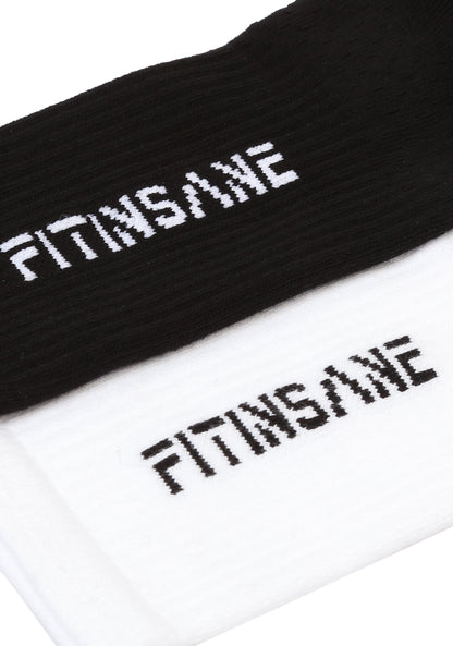 Fitinsane Siyah ve Beyaz Çoraplar – logo detayı yakın çekim